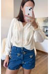 Short en jeans avec sequins