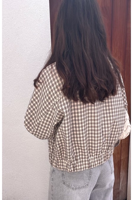 Veste beige à carreaux