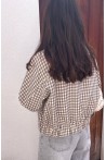 Veste beige à carreaux